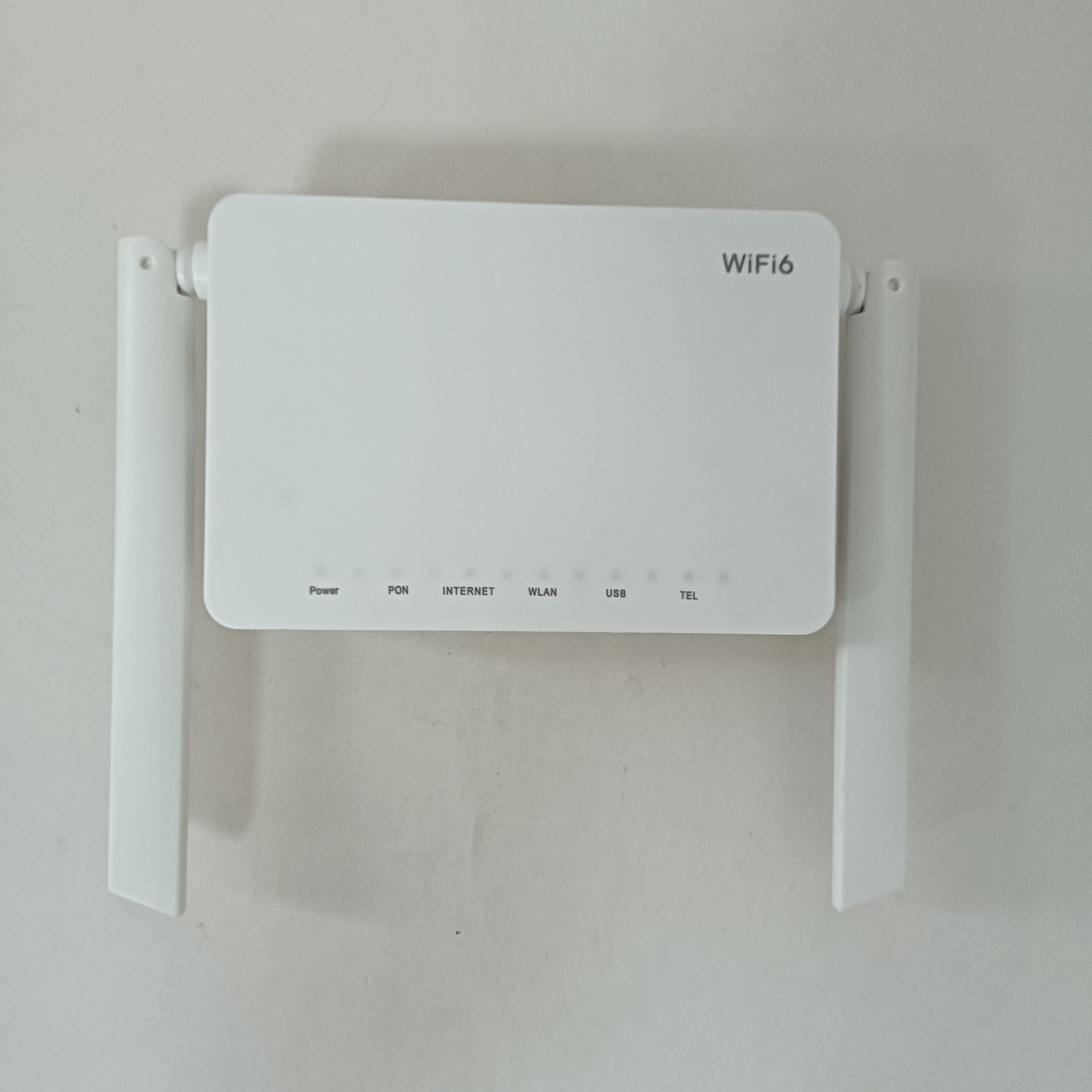 HN8145X6 XG-PON 智能路由型光网络终端 — 下行 10G / 上行 2.5G — Wi-Fi 6 双频(2.4G + 5G)— 4GE + 1POTS + 1USB